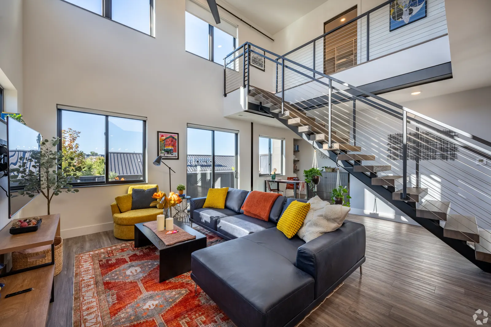 Staged living room at Candy Lofts in Altoona, a Regal-managed community